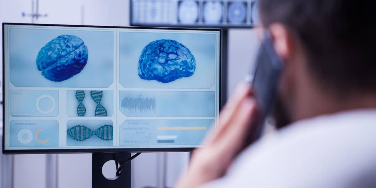 Surgeon performing cranial nerve monitoring during surgery to track nerve activity and protect vital functions.